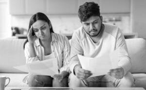 Debt Settlement Scams in India: How to Avoid Fraudulent Agencies featured image Black And White JPG File